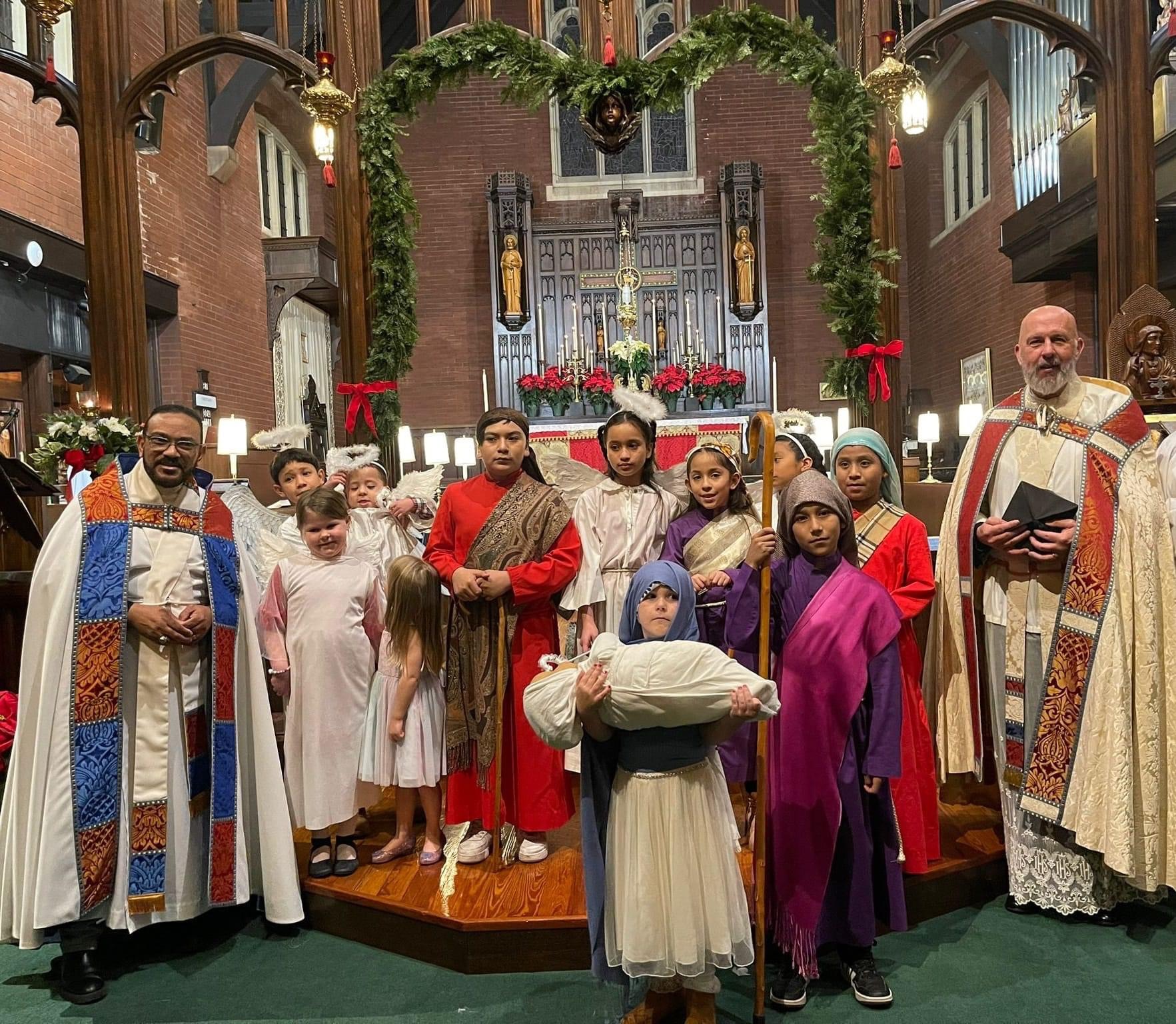 Christmas pageant with Fr. Leonel Polanco & Fr. Kevin Kelly
